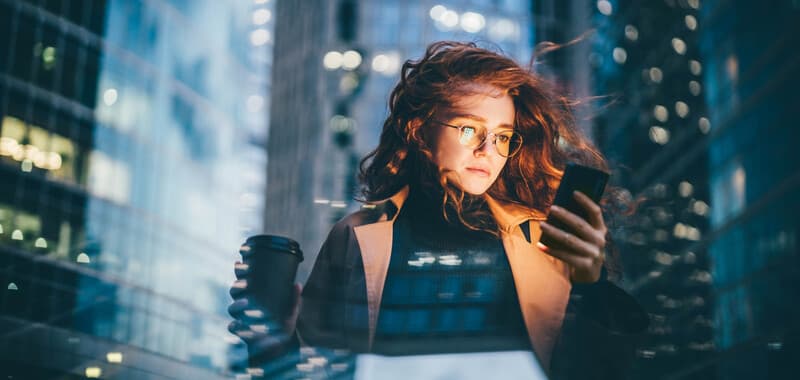 Woman-Reading-Smartphone